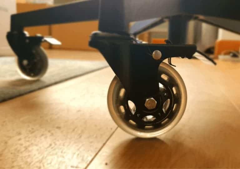 Close up of rollerblade wheels being used on an office chair